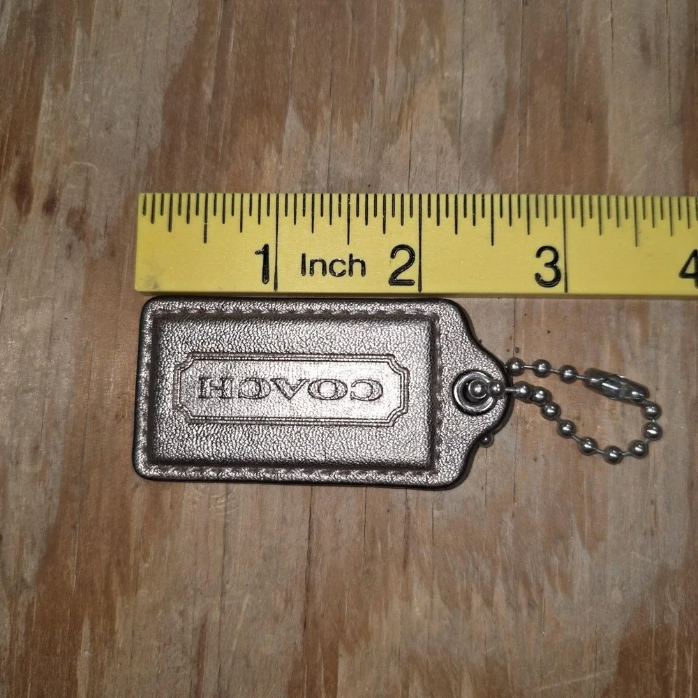 Coach bag tag